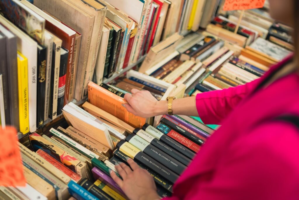 pexels photo 20527032 20527032 A person browsing colorful books in a charming bookstore in Mexico City, emphasizing culture and knowledge.