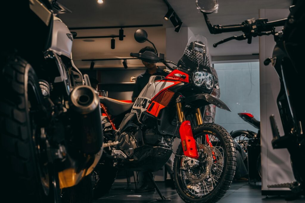 A stylish display of adventure motorcycles in a showroom in Bengaluru, India.